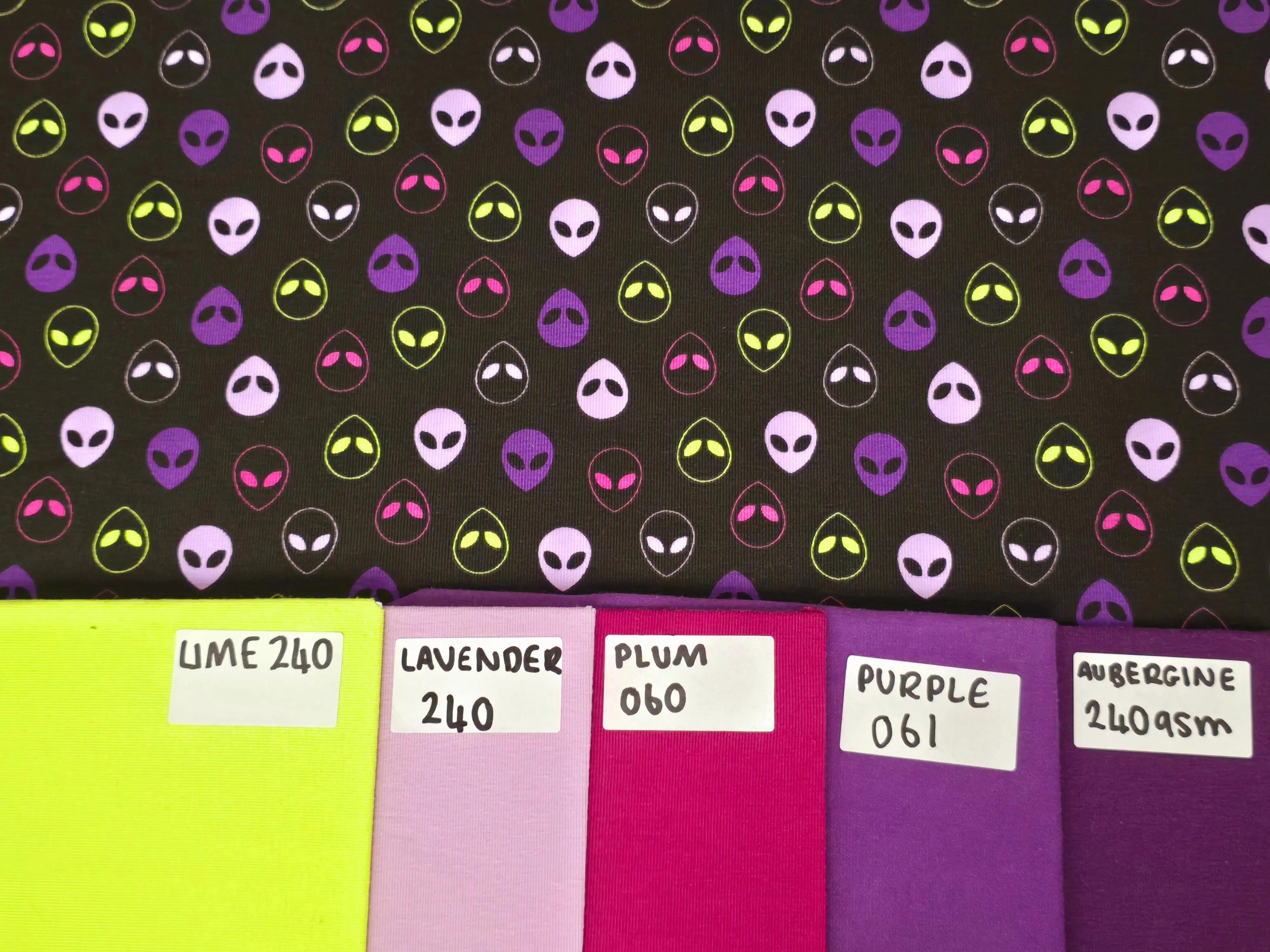 PURPLE SPACE INVADERS COTTON JERSEY PER METRE